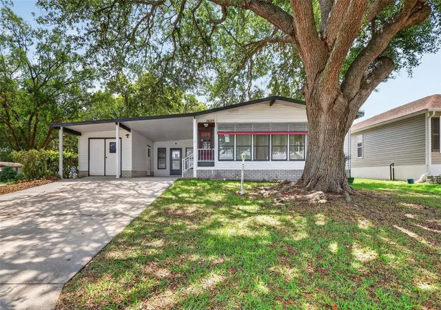 1st image of 1625 Hilton Head Blvd, Lady Lake, FL 32159 | MLS# O6408296