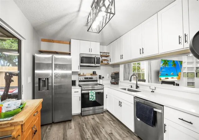 Photo 3 of Townhouse for sale at 933 Hamilton Ct, Palm Harbor, FL 34683 | MLS# TB8509208 | Listing updated on 2026-10-07