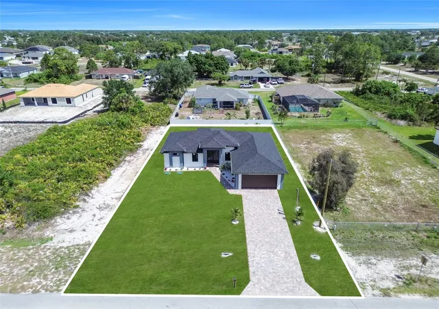 Photo 2 of Single family home for sale at 2606 40th Street, Lehigh Acres, FL 33976 | MLS# TB8509274 | Listing updated on 2026-05-21