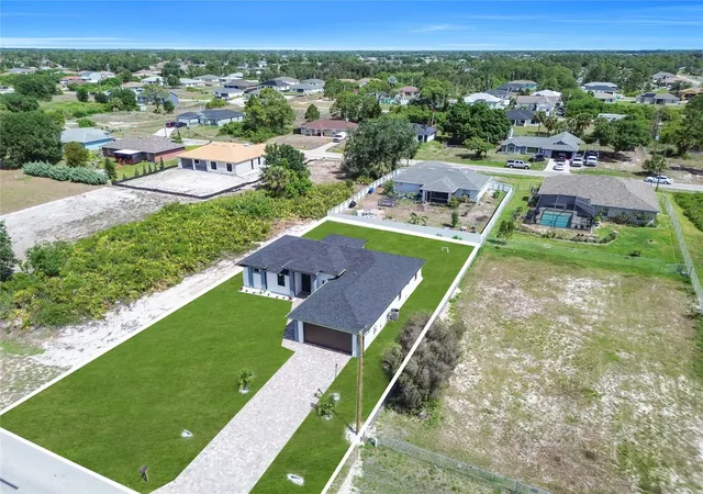 Photo 3 of Single family home for sale at 2606 40th Street, Lehigh Acres, FL 33976 | MLS# TB8509274 | Listing updated on 2026-05-21