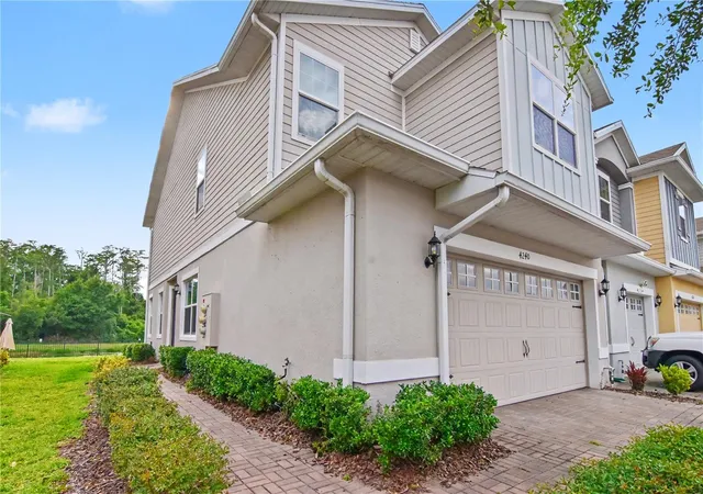 Photo 1 of Townhouse for sale at 4240 Gumbo Limbo Dr, Orlando, FL 32822 | MLS# O6408498 | Listing updated on 2026-09-04