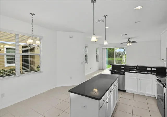 Photo 2 of Townhouse for sale at 4240 Gumbo Limbo Dr, Orlando, FL 32822 | MLS# O6408498 | Listing updated on 2026-09-04