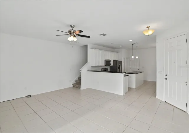 Photo 4 of Townhouse for sale at 4240 Gumbo Limbo Dr, Orlando, FL 32822 | MLS# O6408498 | Listing updated on 2026-09-04