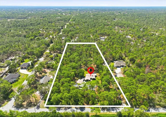 Photo 3 of Single family home for sale at 9032 Birmingham Ave, Weeki Wachee, FL 34613 | MLS# W7885838 | Listing updated on 2026-09-28