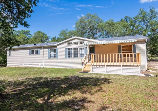 Photo 1 of Manufactured home for sale at 14221 Hurricane Dr, Weeki Wachee, FL 34614 | MLS# TB8509527 | Listing updated on 2026-08-22