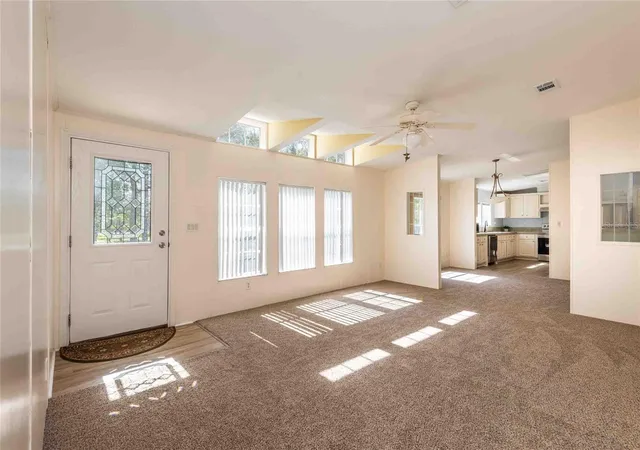 Photo 3 of Manufactured home for sale at 14221 Hurricane Dr, Weeki Wachee, FL 34614 | MLS# TB8509527 | Listing updated on 2026-08-22