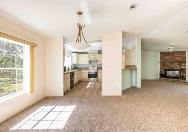 Photo 3 of Manufactured home for sale at 14221 Hurricane Dr, Weeki Wachee, FL 34614 | MLS# TB8509527 | Listing updated on 2026-08-22