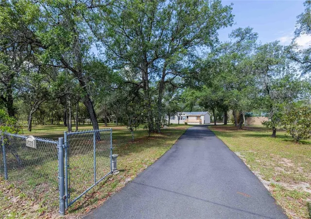 Photo 2 of Manufactured home for sale at 14221 Hurricane Dr, Weeki Wachee, FL 34614 | MLS# TB8509527 | Listing updated on 2026-10-09