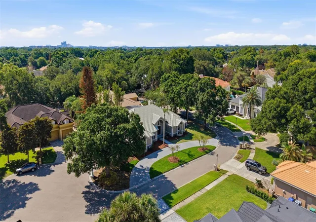 Photo 3 of Single family home for sale at 8935 Jonathan Manor Dr, Orlando, FL 32819 | MLS# O6408670 | Listing updated on 2026-09-02