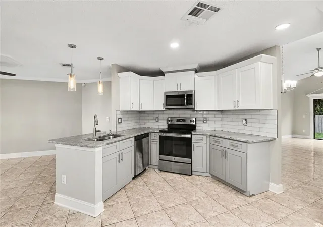Photo 3 of Single family home for sale at 134 Coralwood Cir, Kissimmee, FL 34743 | MLS# O6408676 | Listing updated on 2026-08-27