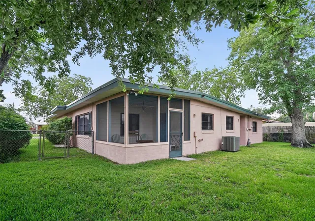 Photo 3 of Single family home for sale at 580 Gardenia Cir, Titusville, FL 32796 | MLS# O6408699 | Listing updated on 2026-08-07