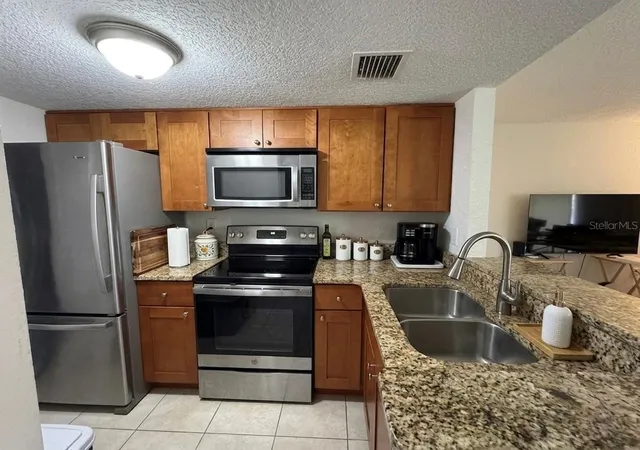 Photo 3 of Condo for sale at 554 Orange Dr #15, Altamonte Springs, FL 32701 | MLS# O6408724 | Listing updated on 2026-08-05
