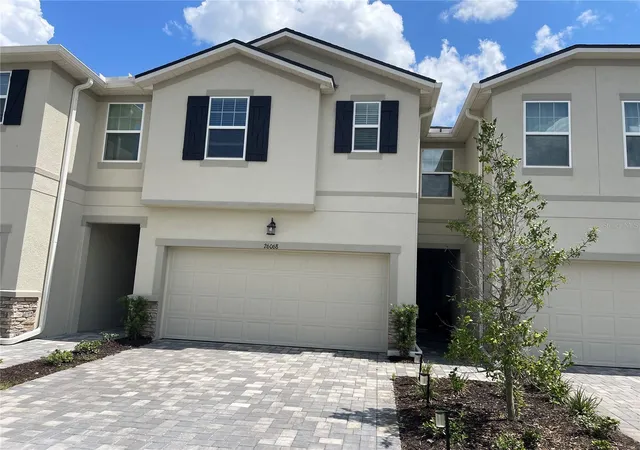 Photo 3 of Townhouse for sale at 26068 Woven Wicker Bnd, Lutz, FL 33559 | MLS# TB8509739 | Listing updated on 2026-08-01