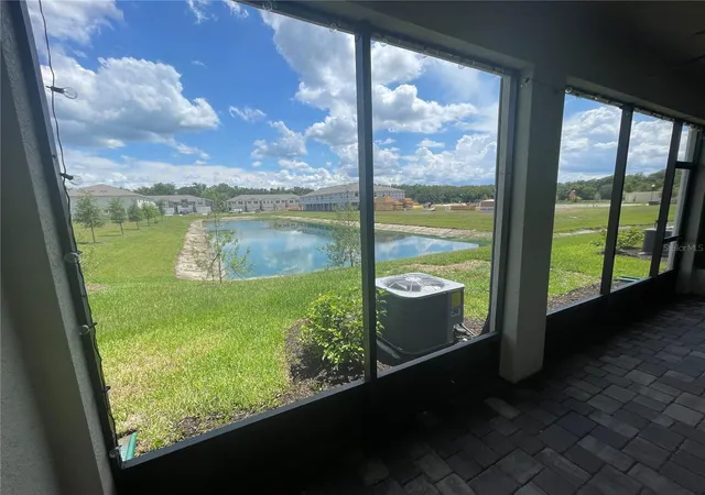 Photo 3 of Townhouse for sale at 26068 Woven Wicker Bnd, Lutz, FL 33559 | MLS# TB8509739 | Listing updated on 2026-08-01