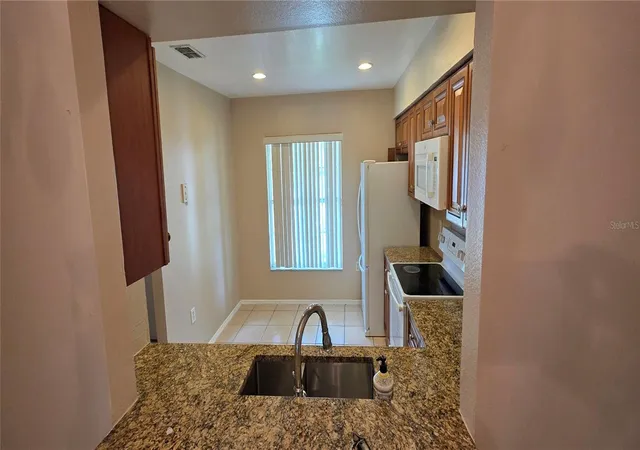 Photo 4 of Condo for sale at 13313 Fairway Glen Dr #104, Orlando, FL 32824 | MLS# S5150138 | Listing updated on 2026-09-08
