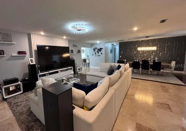 Photo 3 of Single family home for sale at 4627 Woodlot Ct, Orlando, FL 32835 | MLS# O6408777 | Listing updated on 2026-09-05