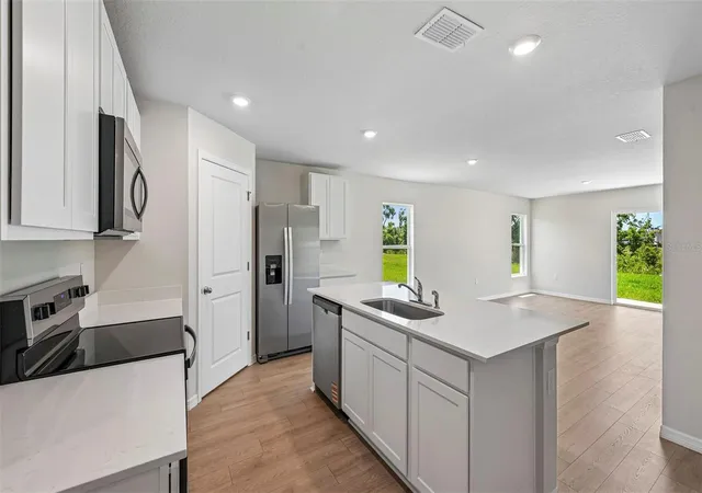 Photo 3 of Single family home for sale at 12411 Hopscotch Ave E, Parrish, FL 34219 | MLS# A4694092 | Listing updated on 2026-09-17