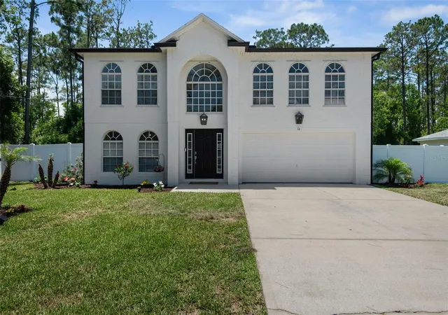 Photo 1 of Single family home for sale at 14 Llewellyn Trl, Palm Coast, FL 32164 | MLS# FC318633 | Listing updated on 2026-09-13