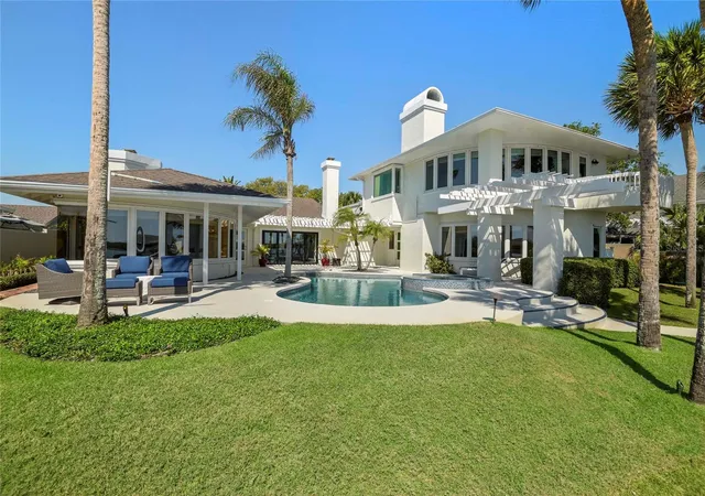 Photo 1 of Single family home for sale at 1215 Commodore Dr, New Smyrna Beach, FL 32168 | MLS# O6409027 | Listing updated on 2026-09-22