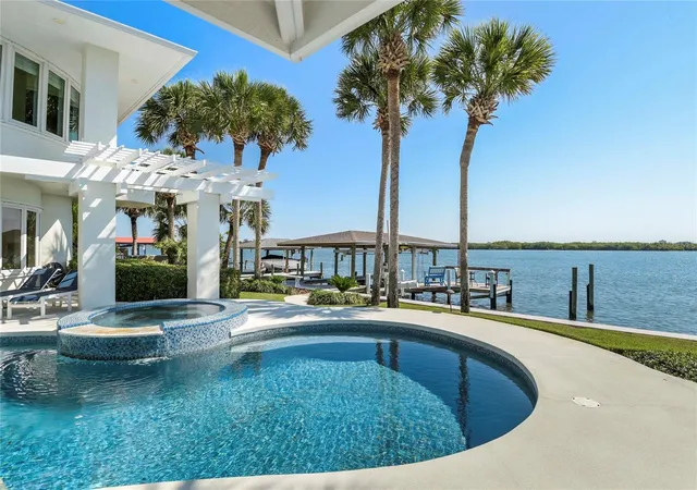 Photo 2 of Single family home for sale at 1215 Commodore Dr, New Smyrna Beach, FL 32168 | MLS# O6409027 | Listing updated on 2026-09-23