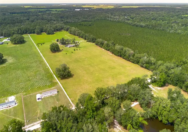 Homes for sale in Mc Alpin, FL | 11990 156th St, Mc Alpin, FL 32062 | MLS# OM724958