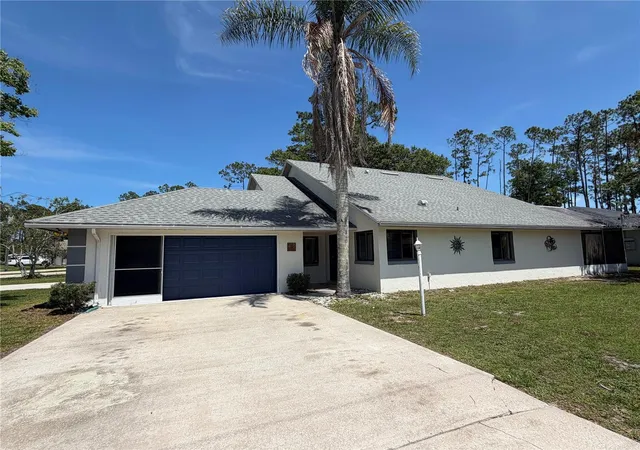 2nd image of 12 Wellwood Ln #A & B, Palm Coast, FL 32164 | MLS# FC318652
