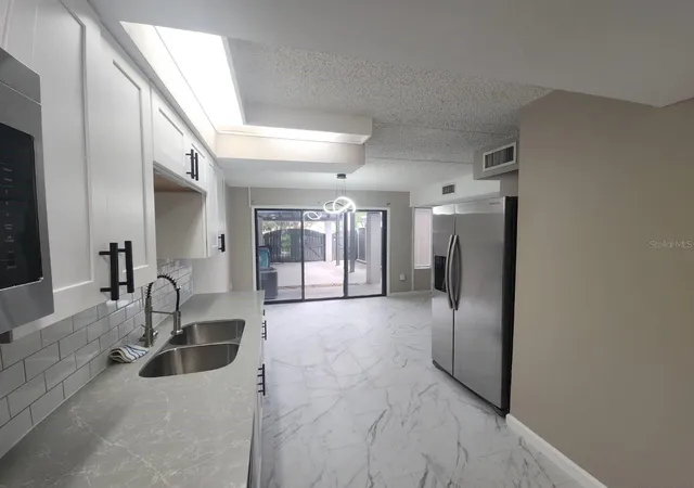 3rd image of 5132 Cypress Creek Dr #104, Orlando, FL 32811 | MLS# O6409244