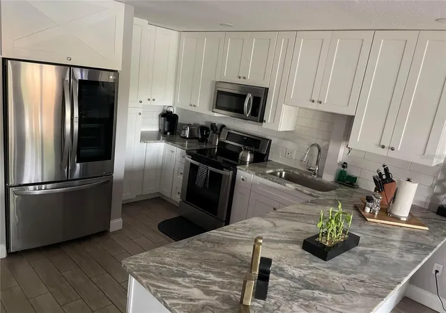 Photo 3 of Condo for sale at 2595 Cyprus Dr #4-217, Palm Harbor, FL 34684 | MLS# TB8510415 | Listing updated on 2026-10-01