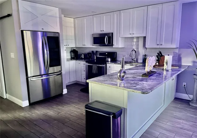 Photo 4 of Condo for sale at 2595 Cyprus Dr #4-217, Palm Harbor, FL 34684 | MLS# TB8510415 | Listing updated on 2026-10-01