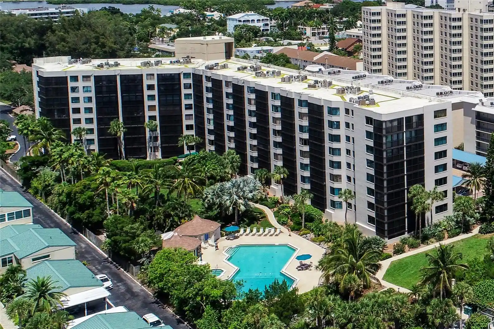 Listing Photo 1 - Condo for sale in Casarina Condominiums located at 5880 Midnight Pass Rd, Sarasota, FL 34242 - Unit #907