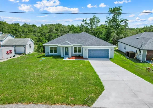 Single family home for sale at 1622 N Merrick Dr, Deltona, FL 32725 | MLS# O6409390 | Listing updated on 2026-09-17