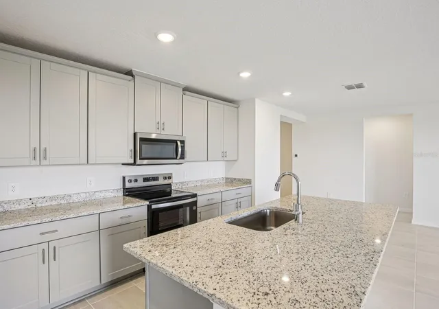 Photo 3 of Single family home for sale at 823 Sunshower Dr, Lady Lake, FL 32159 | MLS# TB8510554 | Listing updated on 2026-10-07