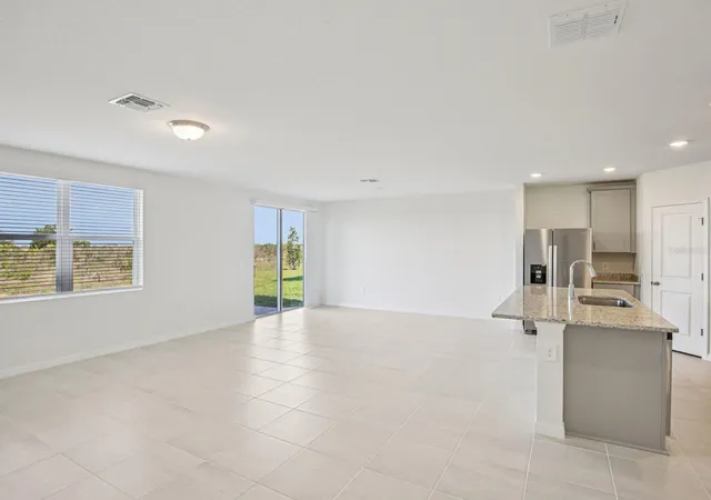 Photo 4 of Single family home for sale at 823 Sunshower Dr, Lady Lake, FL 32159 | MLS# TB8510554 | Listing updated on 2026-10-07