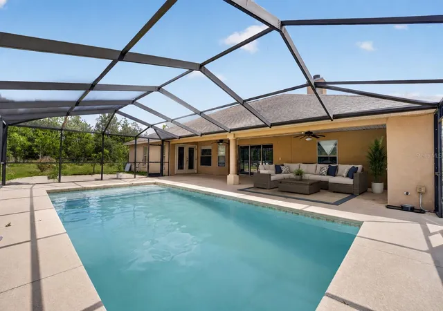 Photo 3 of Single family home for sale at 1098 NW 165th Court Rd, Dunnellon, FL 34432 | MLS# OM725088 | Listing updated on 2026-09-17