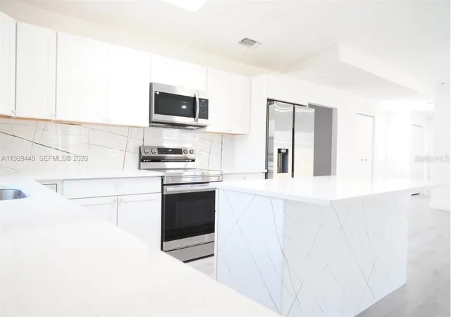 Photo 3 of Single family home for sale at 563 Presque Isle Dr, Port Charlotte, FL 33954 | MLS# C7526419 | Listing updated on 2026-08-26