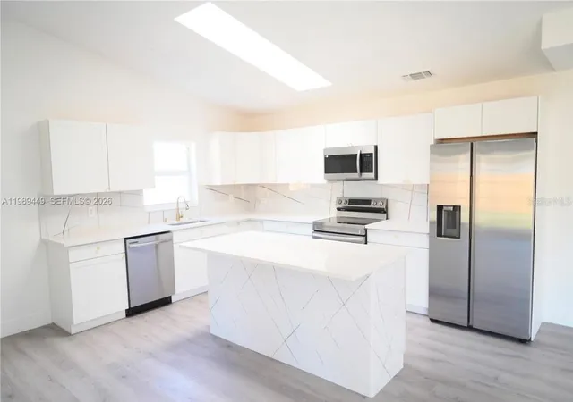 Photo 4 of Single family home for sale at 563 Presque Isle Dr, Port Charlotte, FL 33954 | MLS# C7526419 | Listing updated on 2026-08-26