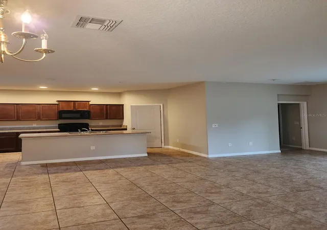 Photo 3 of Single family home for sale at 2765 Carrickton Cir, Orlando, FL 32824 | MLS# O6409680 | Listing updated on 2026-08-13