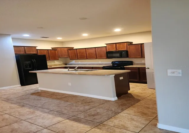 Photo 3 of Single family home for sale at 2765 Carrickton Cir, Orlando, FL 32824 | MLS# O6409680 | Listing updated on 2026-08-13