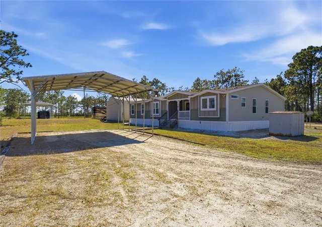 Photo 3 of Manufactured home for sale at 6844 Chad Jason Rd, St Cloud, FL 34773 | MLS# O6409787 | Listing updated on 2026-08-27