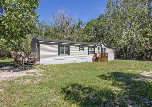 Photo 3 of Manufactured home for sale at 17824 NE 143rd Terrace, Waldo, FL 32694 | MLS# GC540510 | Listing updated on 2026-10-01