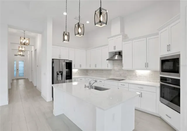 4th image of 6239 Woodhaven Village Dr, Port Orange, FL 32128 | MLS# O6409956