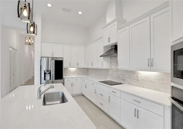5th image of 6239 Woodhaven Village Dr, Port Orange, FL 32128 | MLS# O6409956