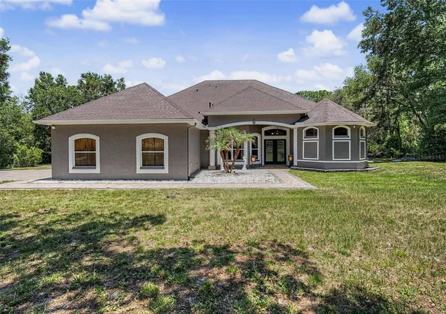 1st image of 10933 Pinto Dr, Hudson, FL 34669 | MLS# TB8511267