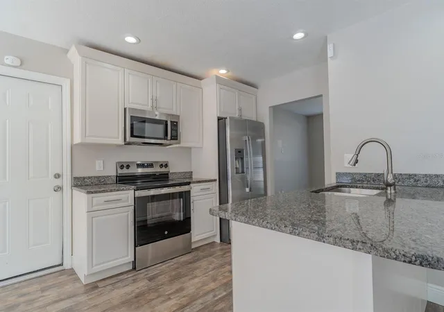 Photo 4 of Single family home for sale at 8018 W Pocahontas Ave, Tampa, FL 33615 | MLS# TB8511378 | Listing updated on 2026-09-30