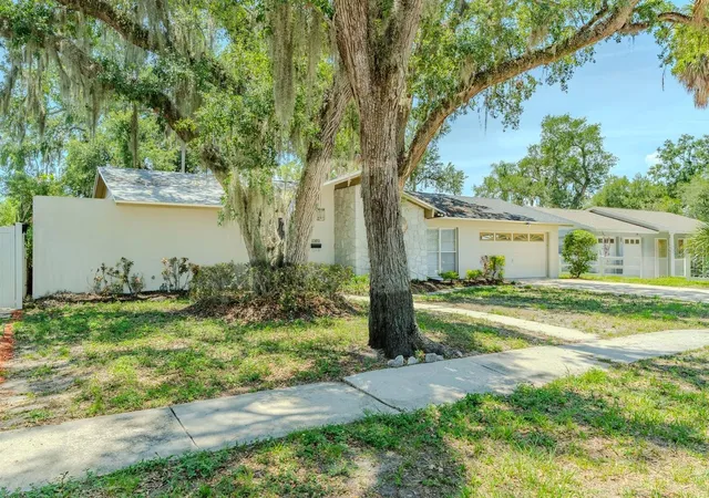 Photo 3 of Single family home for sale at 8018 W Pocahontas Ave, Tampa, FL 33615 | MLS# TB8511378 | Listing updated on 2026-09-30