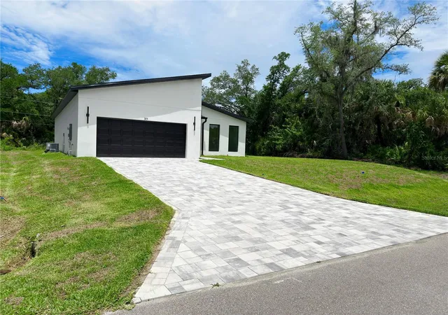Photo 4 of Single family home for sale at 301 Eppinger Dr, Port Charlotte, FL 33953 | MLS# O6410234 | Listing updated on 2026-10-17