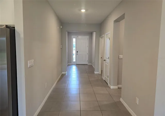 Photo 3 of Single family home for sale at 11370 Timber Grv Ln, Brooksville, FL 34613 | MLS# TB8511531 | Listing updated on 2026-08-04