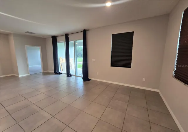 Photo 4 of Single family home for sale at 11370 Timber Grv Ln, Brooksville, FL 34613 | MLS# TB8511531 | Listing updated on 2026-08-04
