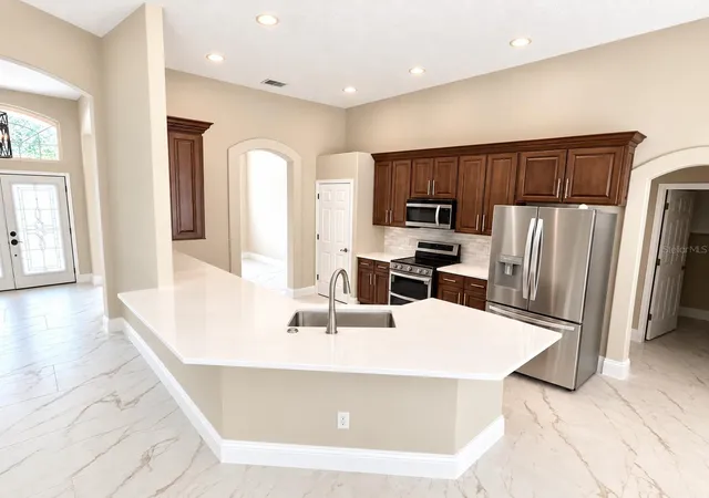 Photo 4 of Sale Pending at 2230 Ridgewind Way, Windermere, FL 34786 | MLS# O6410264 | Listing updated on 2026-09-07