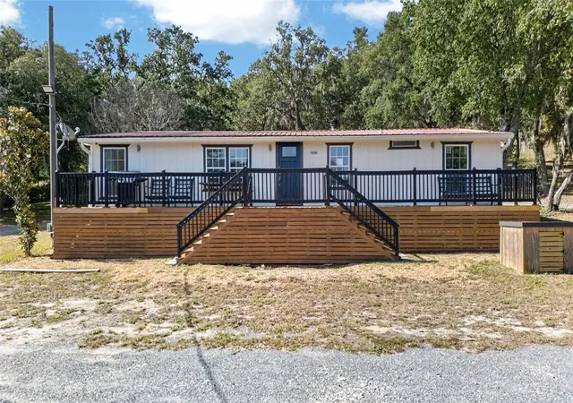 Photo 2 of Manufactured home for sale at 14318 Rock N Roll Rd, Clermont, FL 34715 | MLS# O6410265 | Listing updated on 2026-09-03